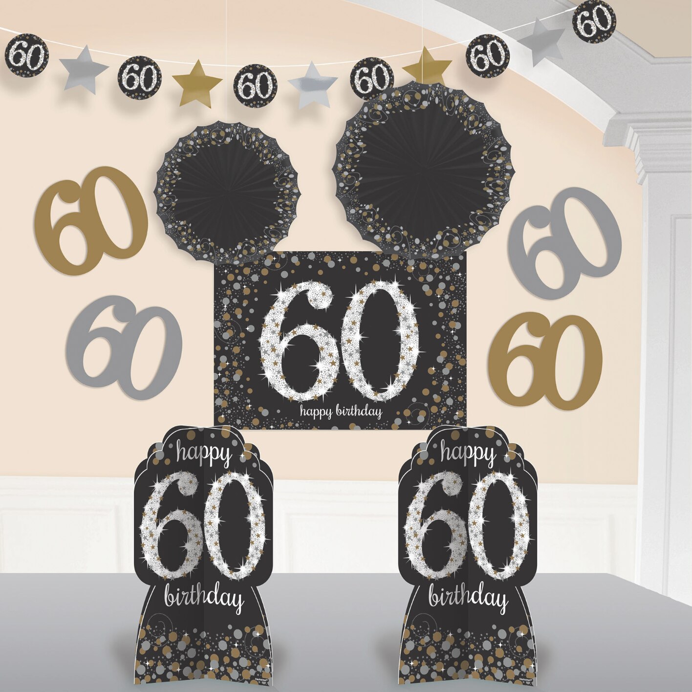 Various black, white, and gold 60th birthday decorations. 