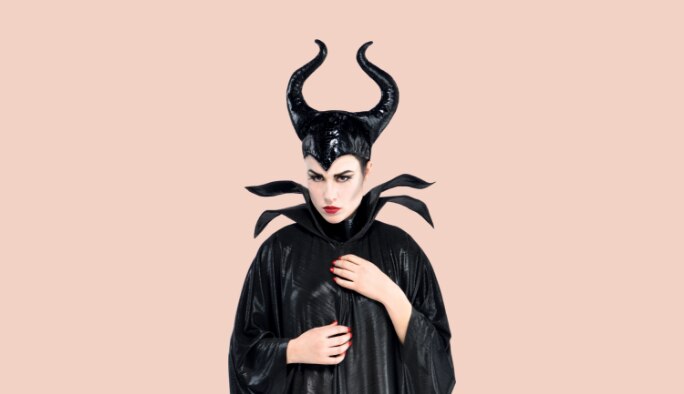 Woman wearing a Maleficent costume.