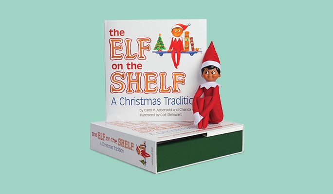 Elf on the shelf toy with book