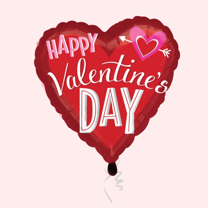 A red heart-shaped Happy Valentine's Day foil balloon.