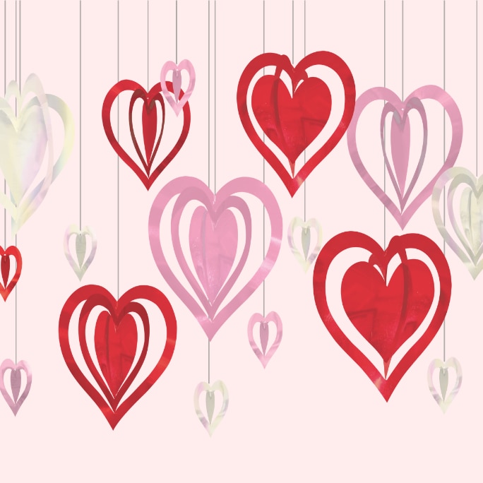 A set of white, pink and red Valentine’s 3D cut-out heart shaped hanging decorations. 