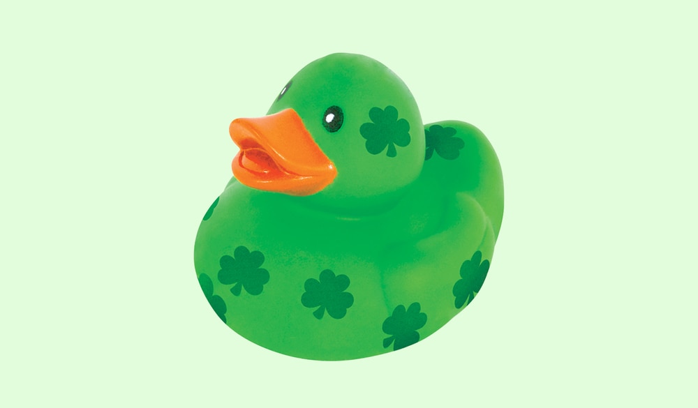 A green St. Patrick's Day rubber duck with a shamrock print. 