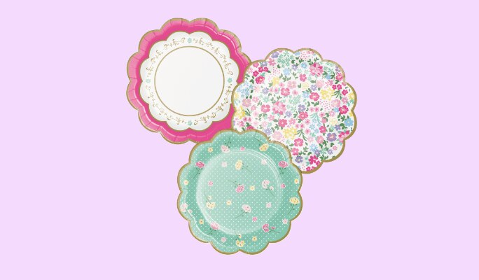 Three 7-inch Floral Tea Party scalloped dessert plates in assorted complementary prints. 