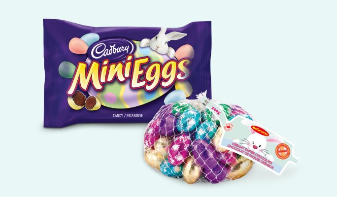 A mesh sack of creamy chocolate Easter eggs, 200-g and a pack of Cadbury Chocolate Mini Eggs, 33-g.