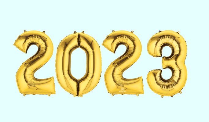 Gold giant 2-0-2-3 number balloons.