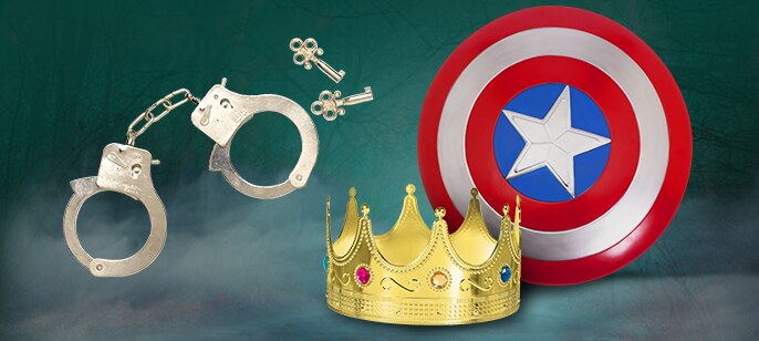A pair of costume handcuffs, a kids' Captain America shield, and a jeweled costume crown.
