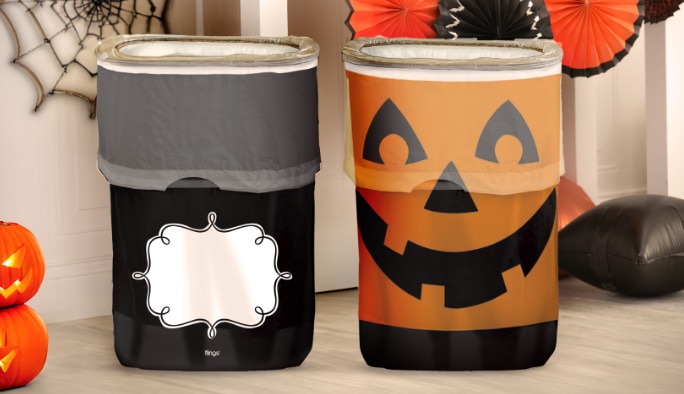A personalized black pop-up trash bin and a Jack-o'-Lantern Flings pop-up trash bin.
