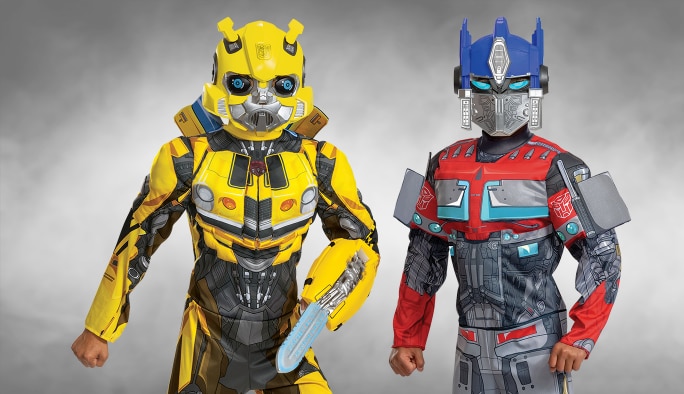 A child wearing a Transformers Bumblebee costume and a child wearing an Optimus Prime costume.