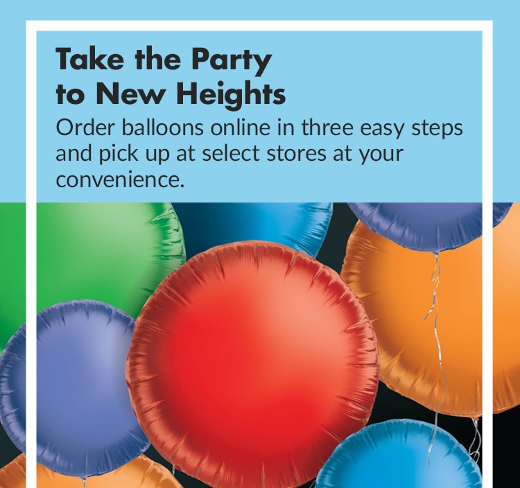 Close-up of colorful round balloons in red, blue, orange, and green