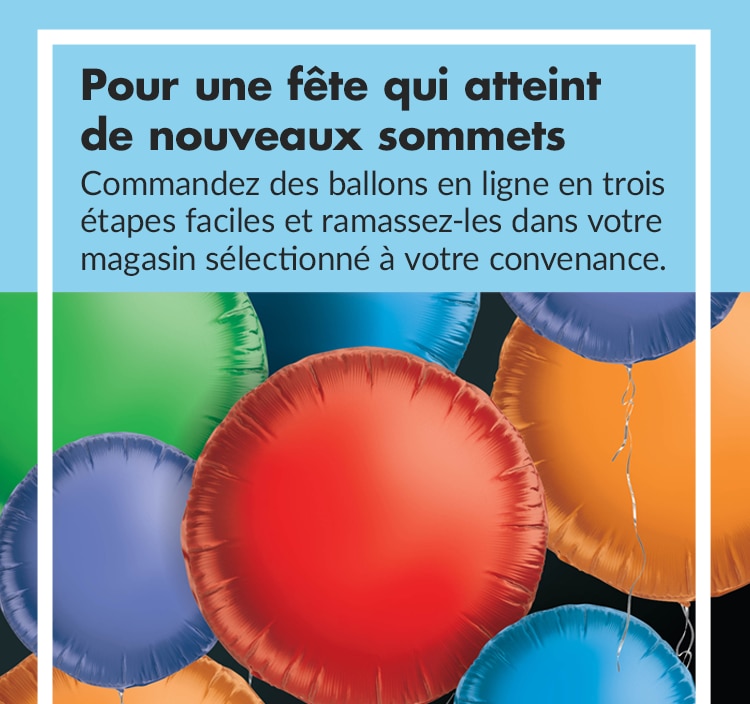Gros plan de ballons ronds de couleur rouge, bleu, orange et vert.