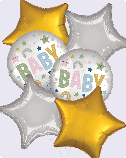 Un ballon blanc et multicolore avec le mot « Baby », entouré de ballons argentés et dorés en forme d’étoiles.