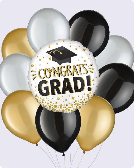 Un ballon blanc avec des confettis dorés, un mortier noir et les mots « Congrats Grad » entouré de ballons noirs, dorés et argentés.