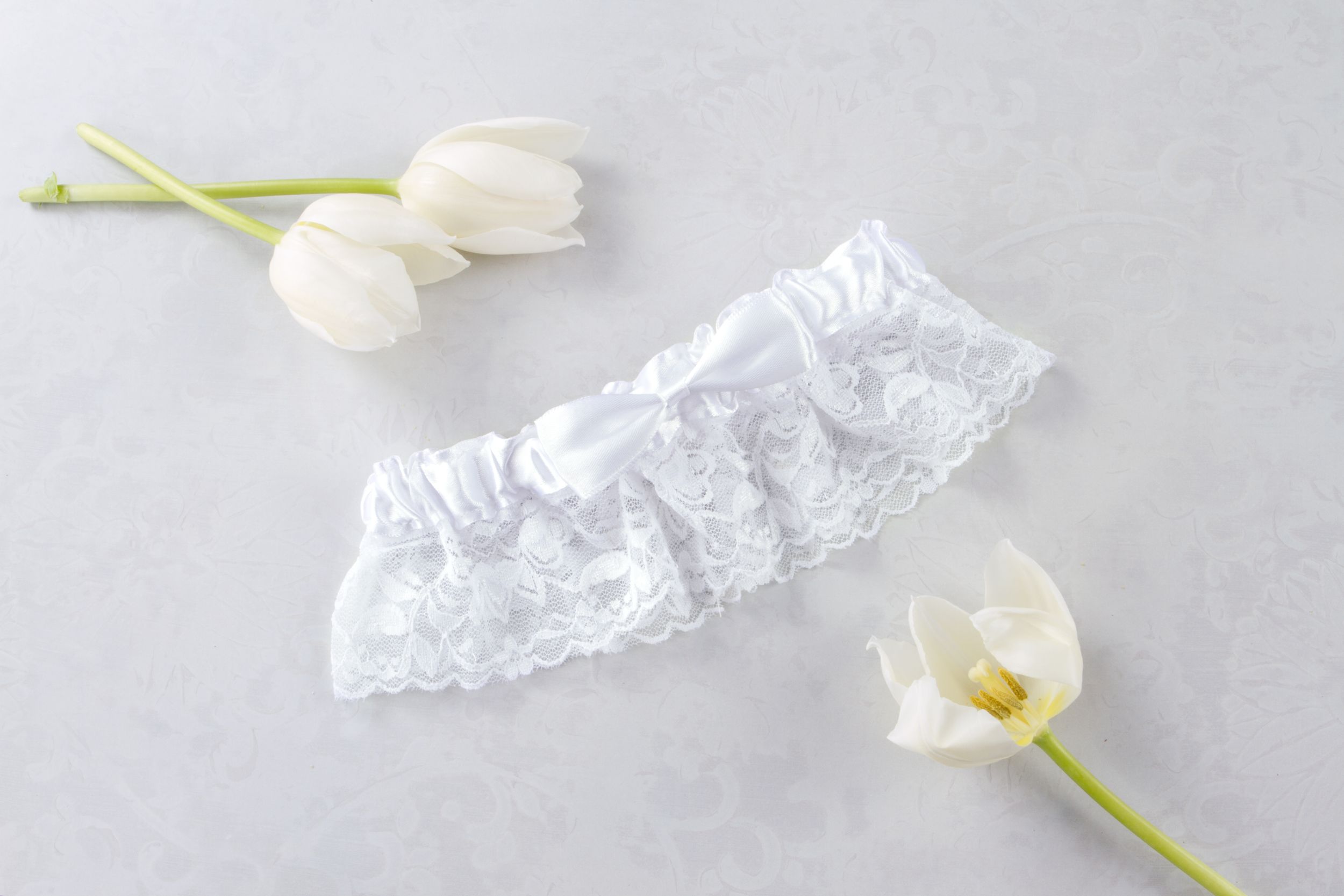 Bridal Flirty Lace Bow Garter, White, One Size, Wearable Accessory for Weddings/Bachelorette Party Overhead_Plunge