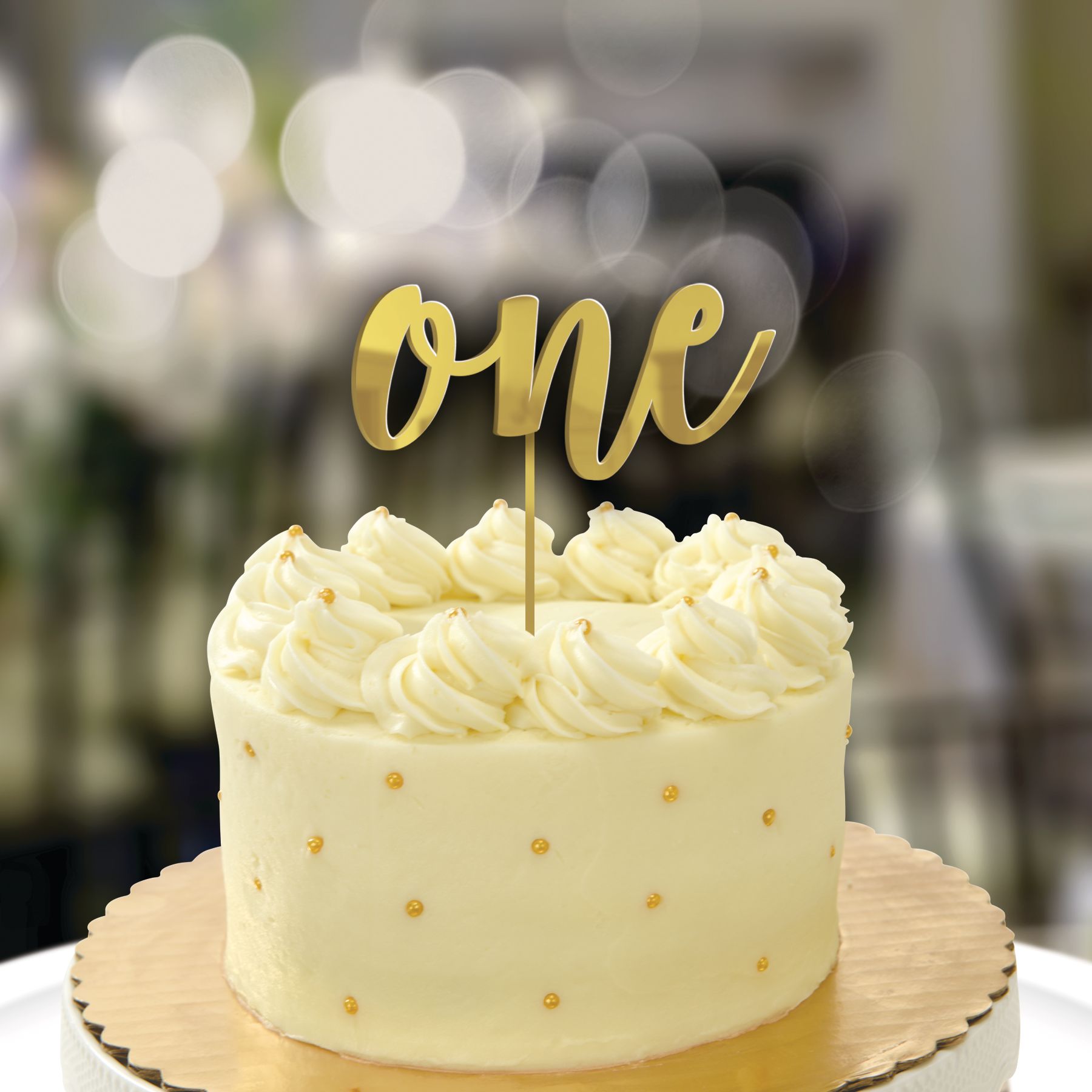First Birthday "One" Foil Cake Treat Topper, Gold, 7-in, for Birthday Party Front_Elevated