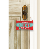 Mini affiche en forme de coussin indiquant Believe in Santa Front_Flat