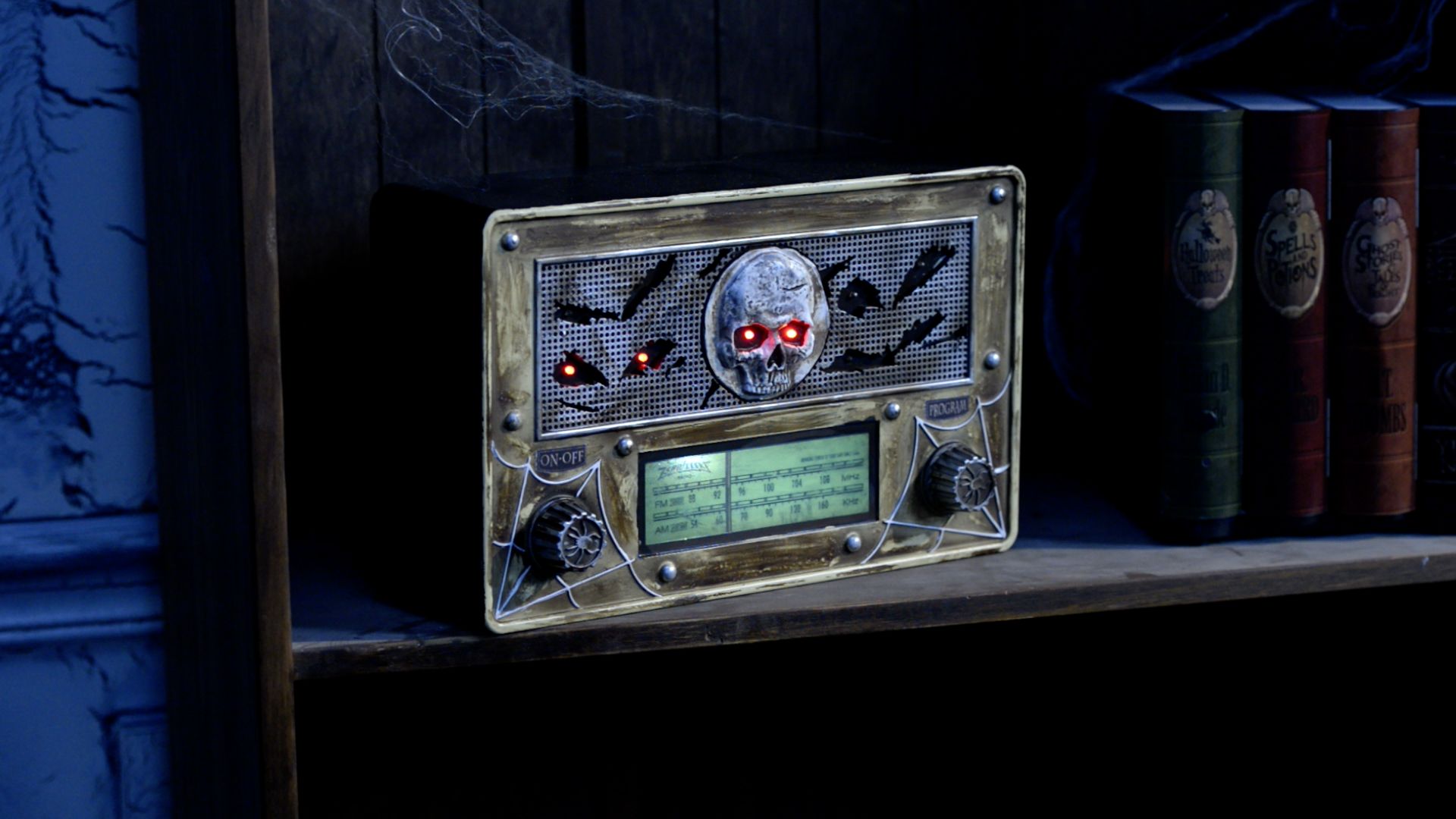 Skull Animated LED Light-Up Haunted Radio with Batteries, Brown, 12-in, Sound & Light Activated Indoor/Outdoor Decoration for Halloween Composite_or_Mixed