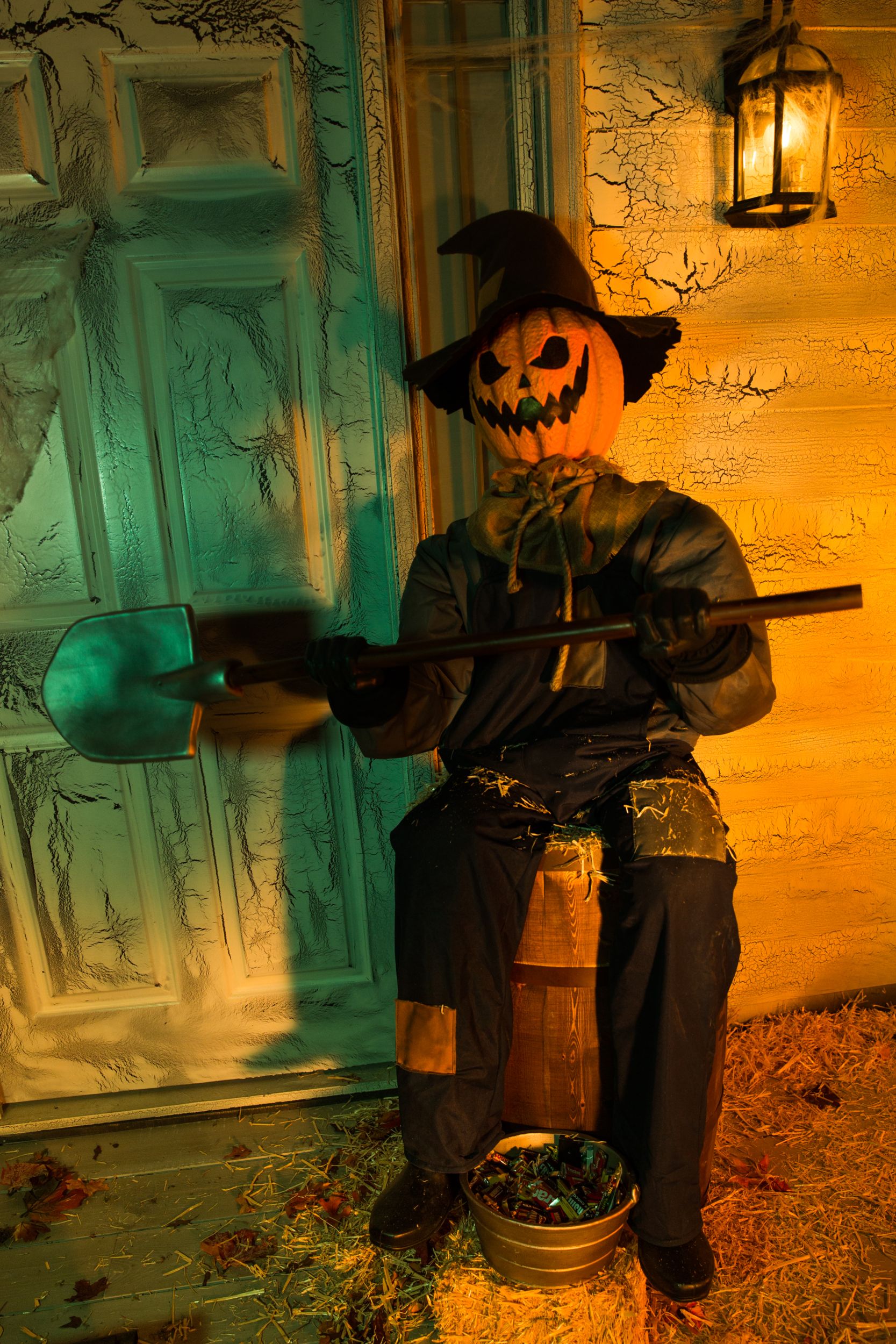 Scarecrow Jack-O'-Lantern Animated Sitting Door Greeter Character, Orange/Blue, 5-ft, Sound Activated Indoor/Outdoor Decoration for Halloween Front_Flat