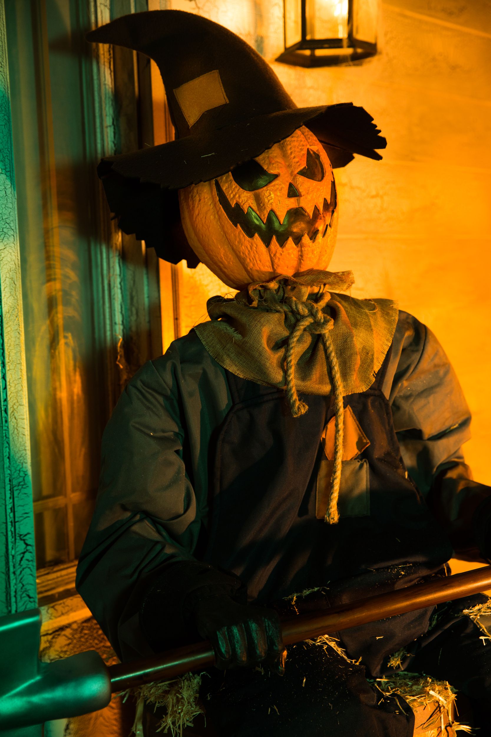 Scarecrow Jack-O'-Lantern Animated Sitting Door Greeter Character, Orange/Blue, 5-ft, Sound Activated Indoor/Outdoor Decoration for Halloween CloseUp