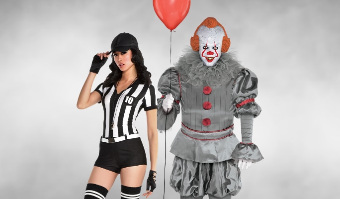 Une femme portant un costume d’arbitre et un homme portant un costume du clown Grippe-Sou.