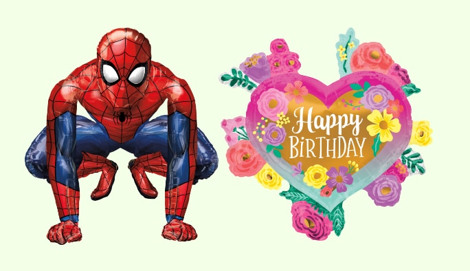 A Spider-Man balloon and a happy birthday heart balloon featuring floral accents. 