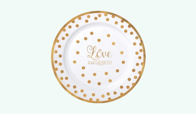 A round sparkling gold and white dinner plate.