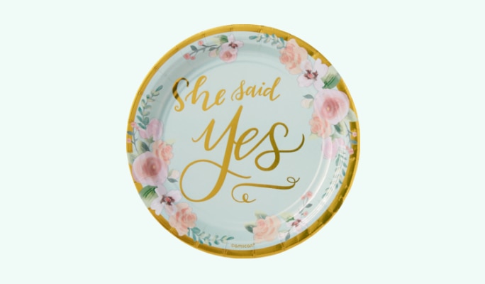 A round metallic Mint to Be floral dessert plate.
