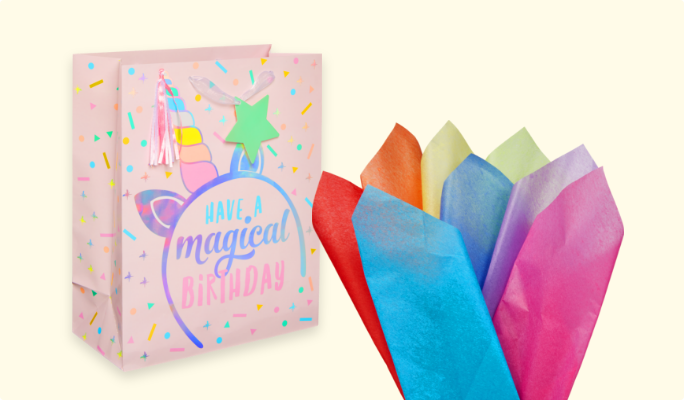 Rainbow tissue paper and a Magical Unicorn gift bag.