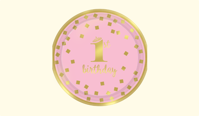 Une assiette en papier ronde or et rose pour premier anniversaire de naissance.