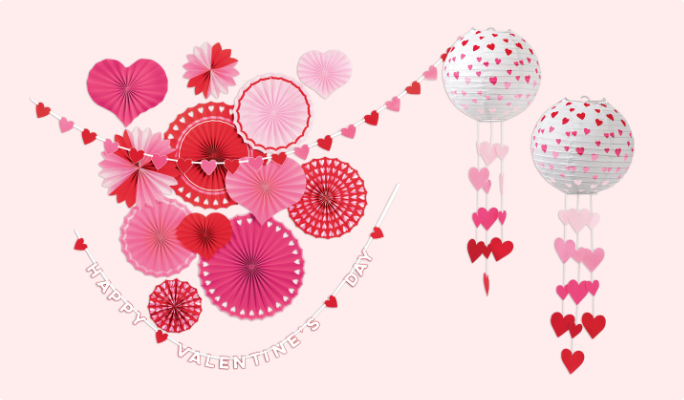 A pink Valentine's paper fan decor kit and two pink and white light-up lanterns.