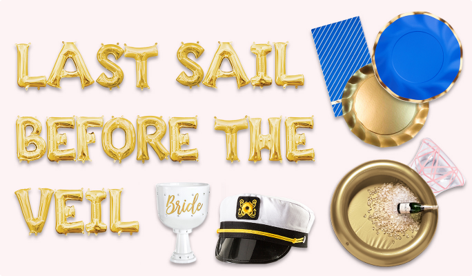 Gold letter balloons that read LAST SAIL BEFORE THE VEIL, blue and gold plates, a stripped blue towel, a gold diamond ring inflatable cooler, a nautical boat captain hat and a white bride goblet cup .