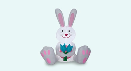 An airblown white bunny with flowers inflatable.