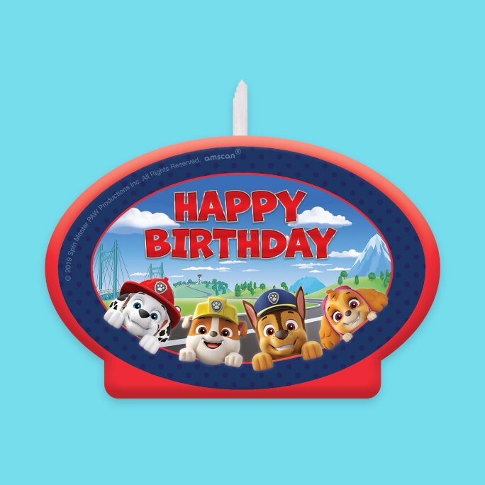 A PAW Patrol candle that reads "HAPPY BIRTHDAY"