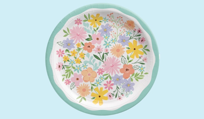 A plate with a floral pattern and light blue trim.
