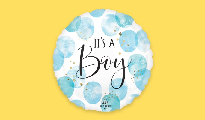 A white & blue balloon that reads "IT'S A Boy"
