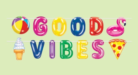 Hanging decor that reads "GOOD VIBES".
