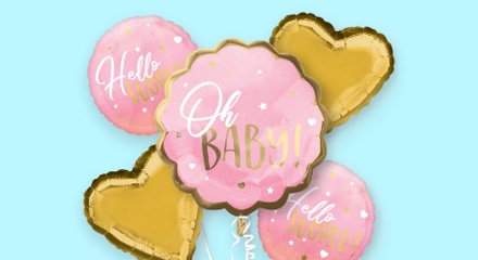 A bouquet of pink and gold baby shower balloons that read "Hello baby", "Oh BABY!" and "Hello WORLD!".