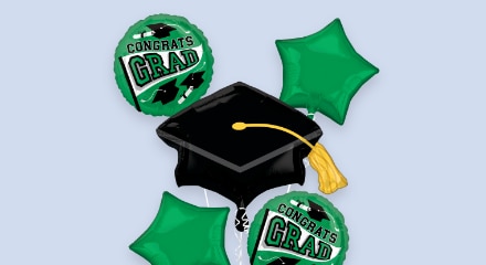 A bouquet of green graduation themed balloons.