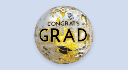 A round, black, silver & gold coloured-balloon that reads 'CONGRATS GRAD'.