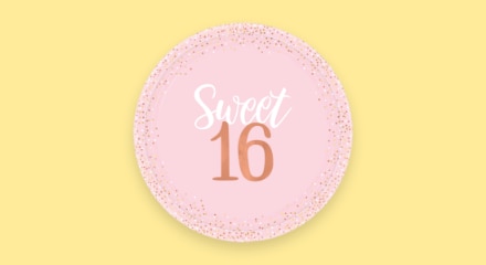 A pink plate that reads 'Sweet 16'.