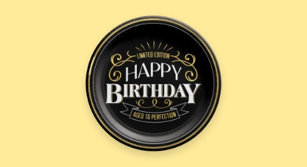 A black plate that reads 'LIMITED EDITION HAPPY BIRTHDAY AGED TO PERFECTION'.