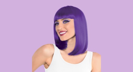 A woman wearing a purple wig.