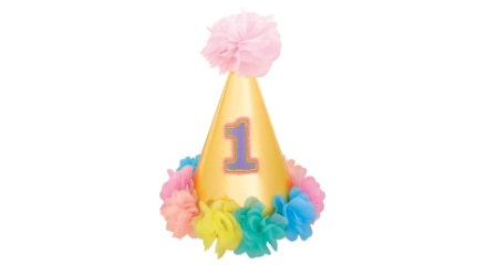 A yellow party hat with colourful pom-poms and the number one printed on it.