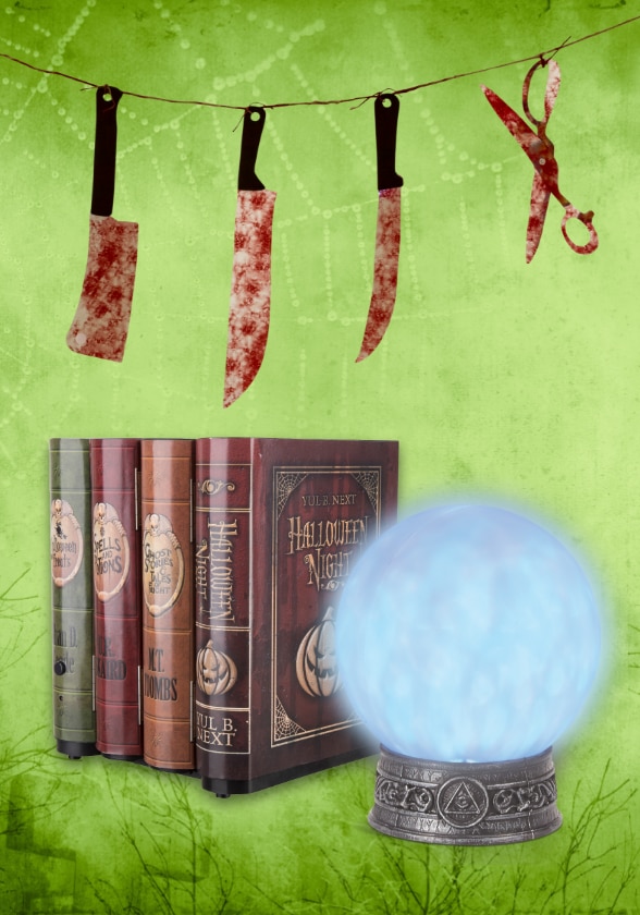 A hanging banner of bloody knives, books and a crystal ball.