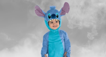 A toddler wearing a Stitch costume.