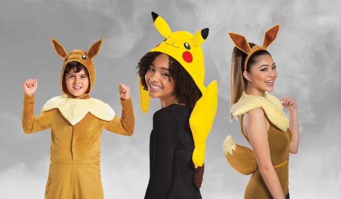 Three people wearing assorted Pokémon character costumes.