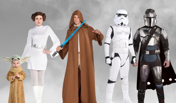 A toddler and four adults wearing assorted Star Wars character costumes.