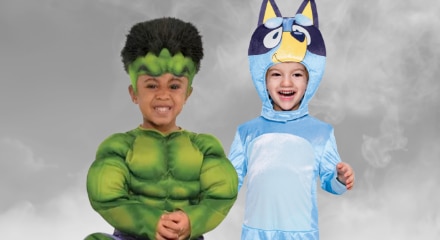 One toddler dressed as the Incredible Hulk and one dressed as Bluey.