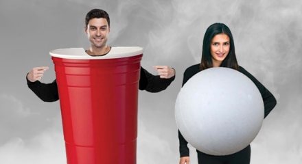 Two people dressed as a red cup and ping pong ball.