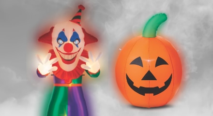 Clown and Jack-o'-Lantern inflatable decorations.