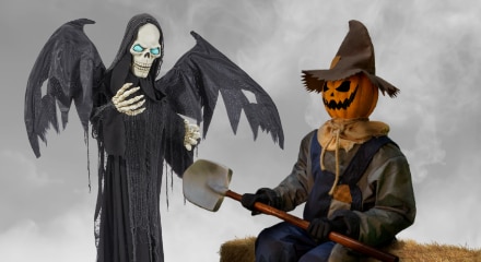 Two animated Halloween character decorations.